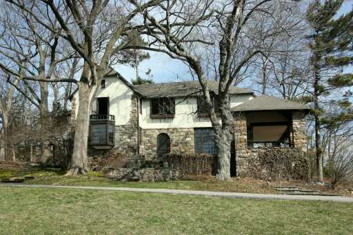 Undisclosed Address Norwalk, CT 06854 - Photo 3 of 8 a view of a house with a yard