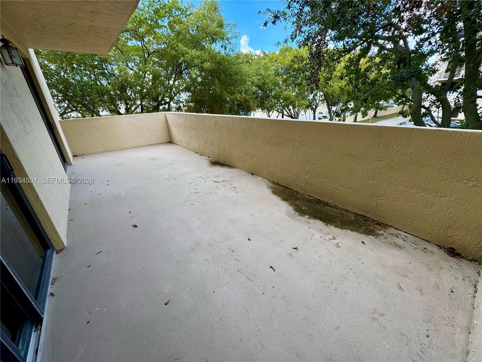 8430 Southwest 8th Street, Unit 201B Miami, FL 33144 - Photo 11 of 14 a view of a outdoor space