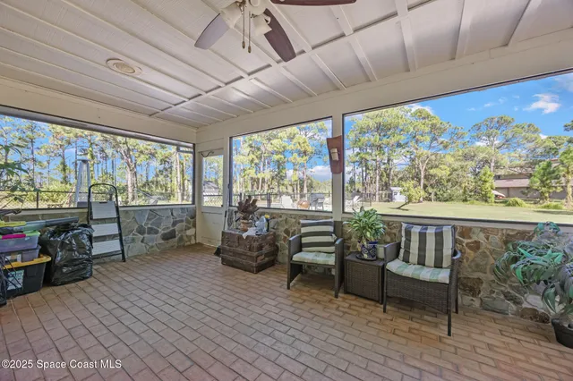 an aerial view of residential house with outdoor space