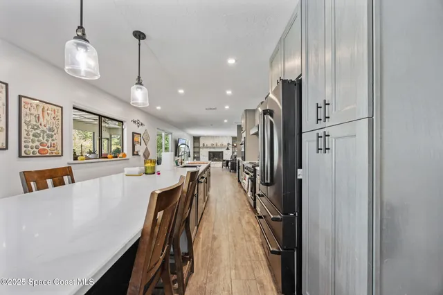 a view of a living room and dining room