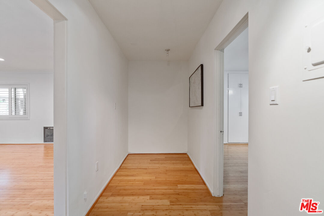 2030 North Vermont Avenue, Unit 6 Los Angeles, CA 90027 - Photo 14 of 25 a view of a hallway with white walls
