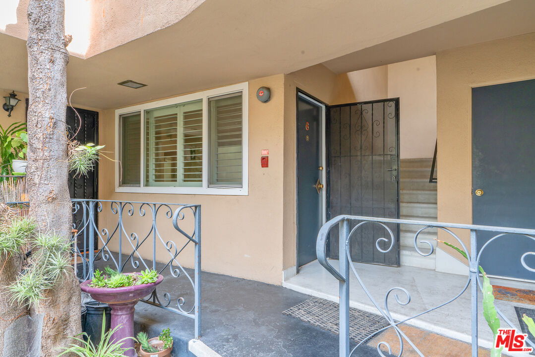 2030 North Vermont Avenue, Unit 6 Los Angeles, CA 90027 - Photo 4 of 25 a view of a chair and table in the patio