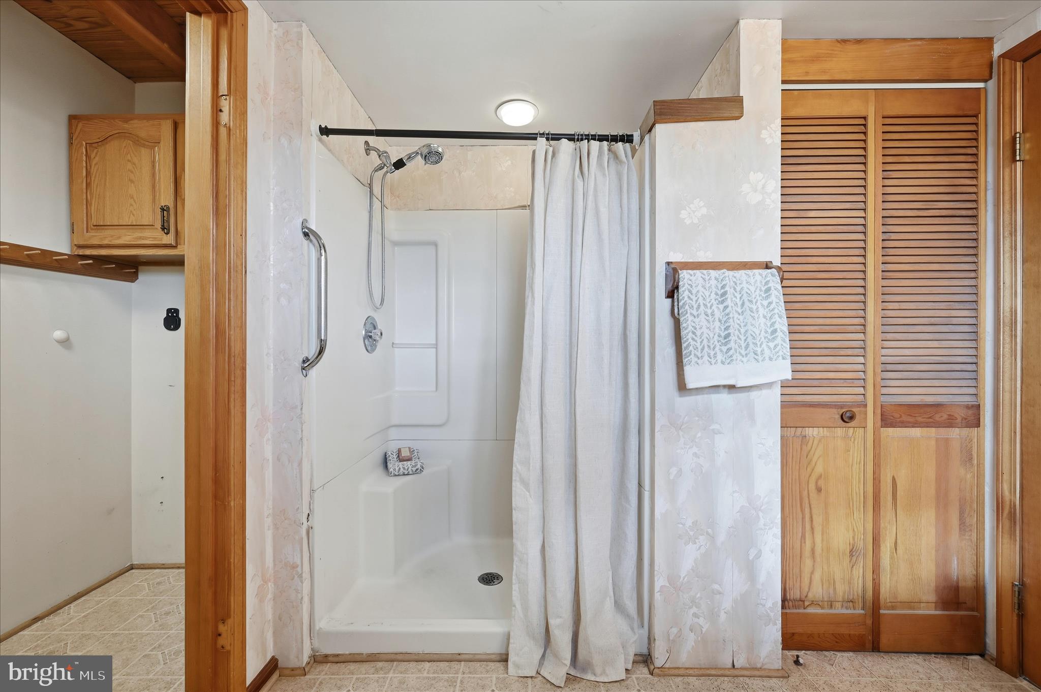 2048 Co Rte 1/11 Kearneysville, WV 25430 - Photo 29 of 95 a bathroom with a shower and a glass door