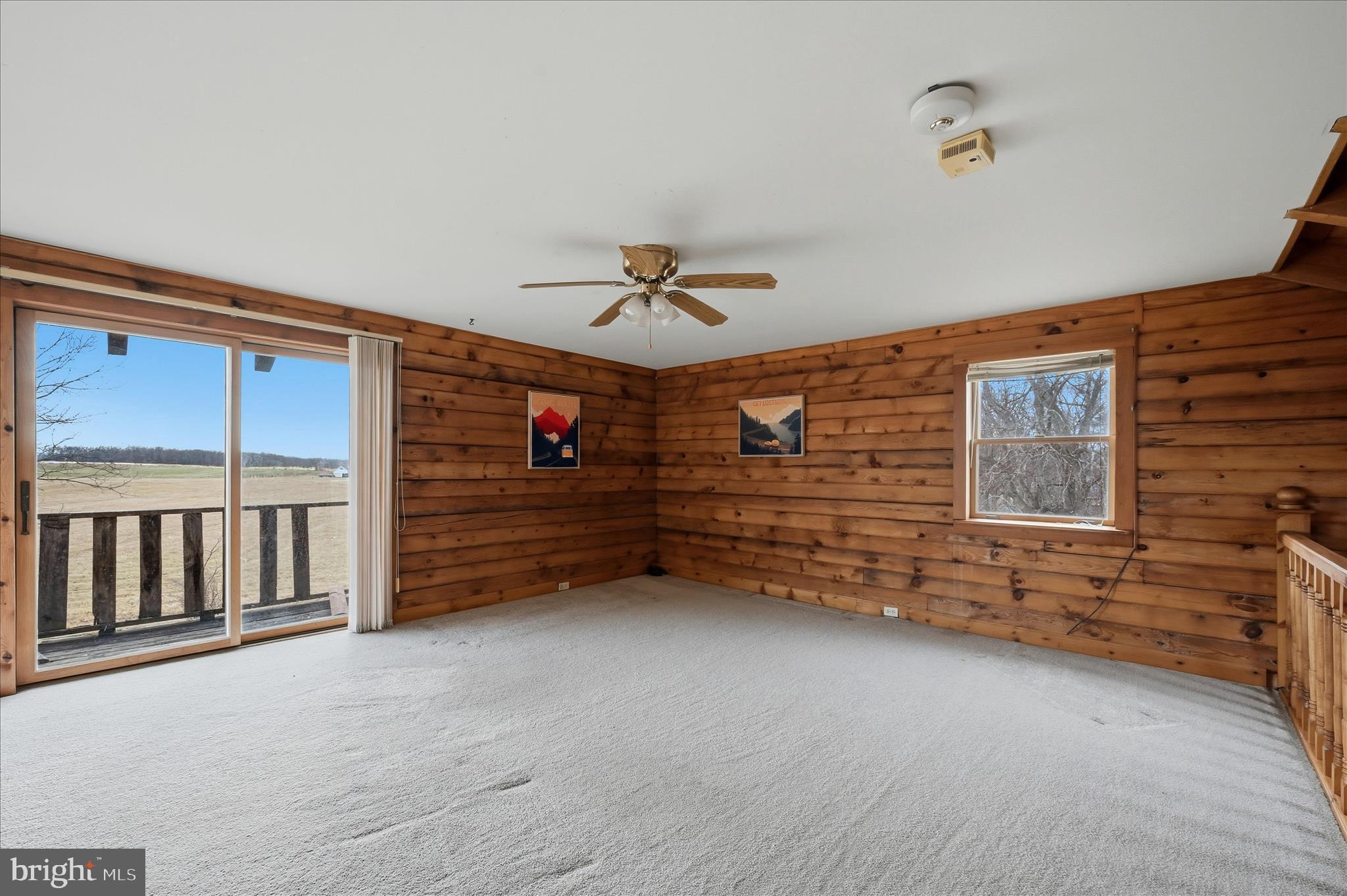2048 Co Rte 1/11 Kearneysville, WV 25430 - Photo 35 of 95 a view of an empty room with a ceiling fan