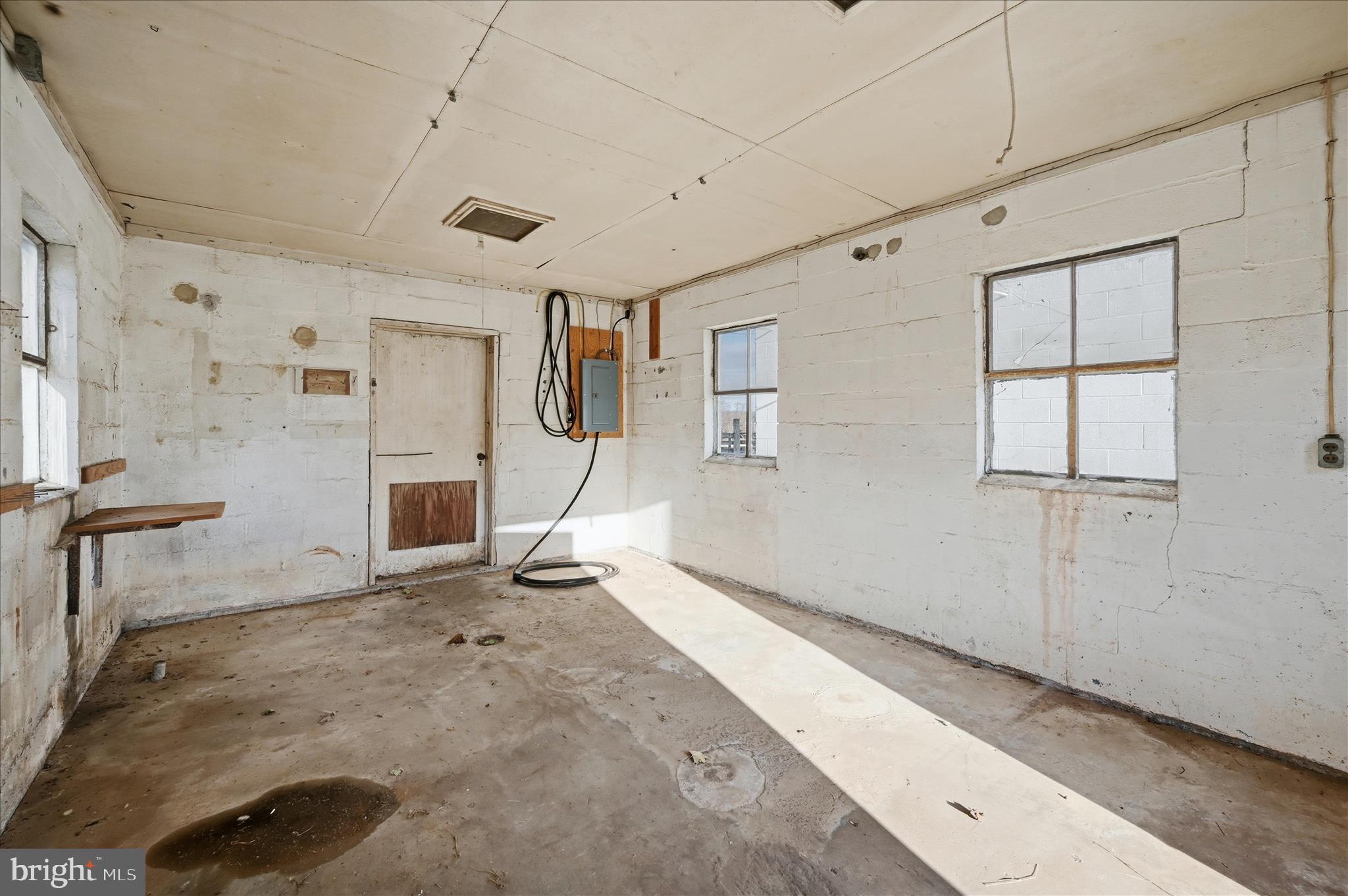 2048 Co Rte 1/11 Kearneysville, WV 25430 - Photo 57 of 95 a view of a livingroom with wooden floor and a ceiling fan