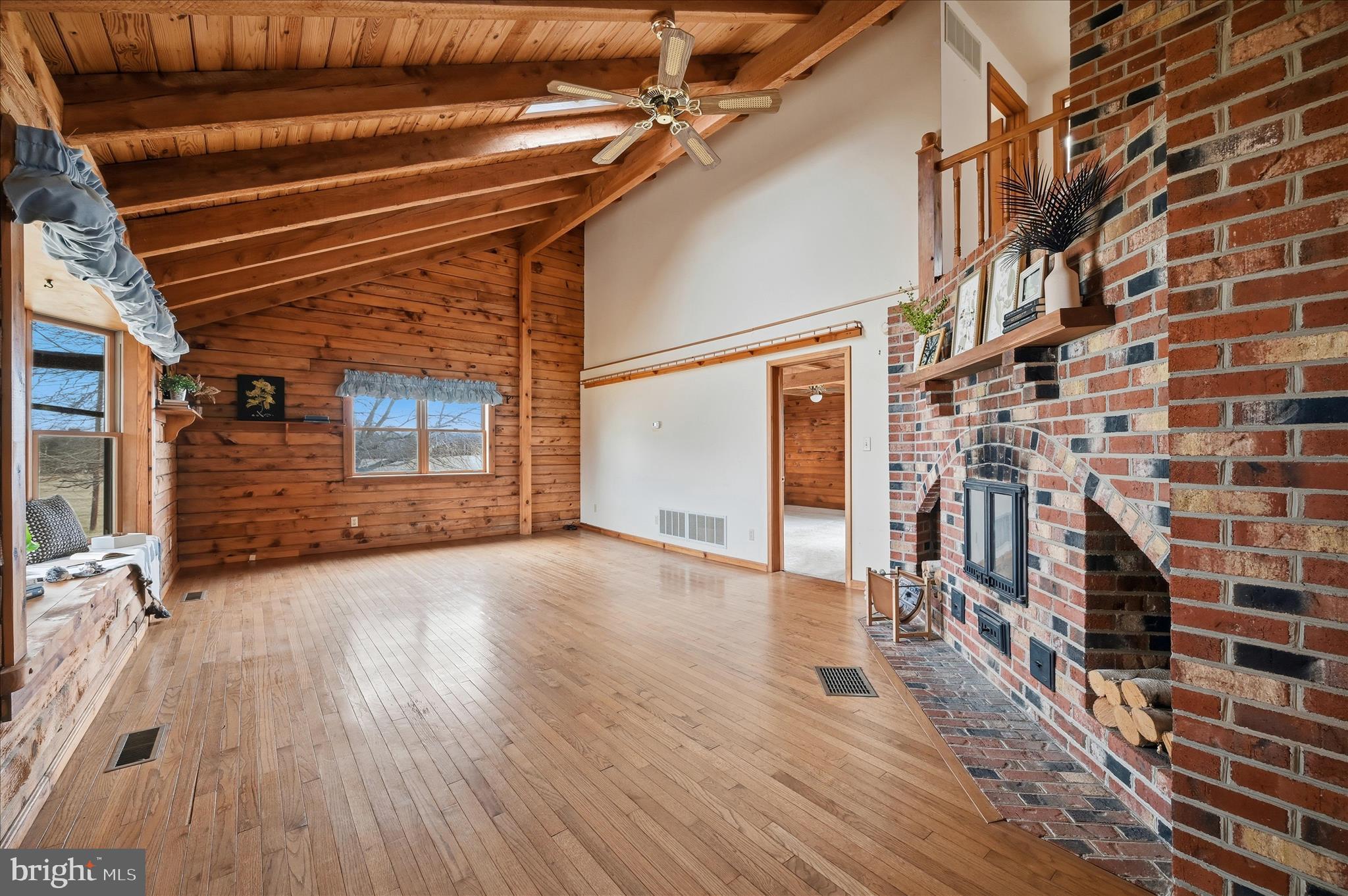 2048 Co Rte 1/11 Kearneysville, WV 25430 - Photo 7 of 95 a view of an empty room with wooden floor