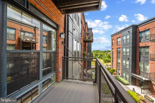 a view of a chairs and table in a backyard