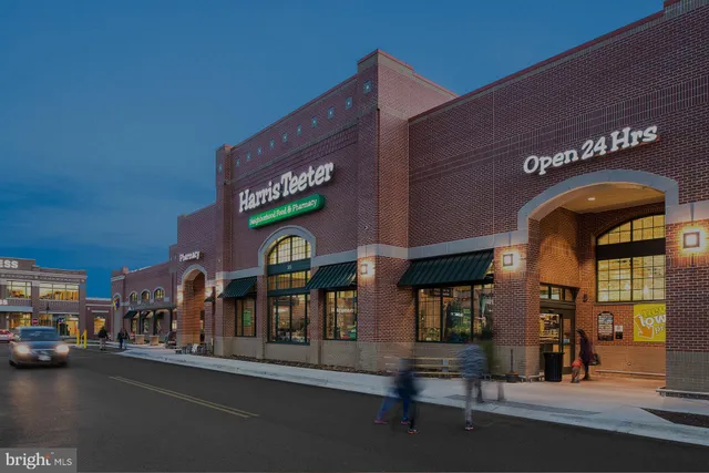 a view of street with sitting area