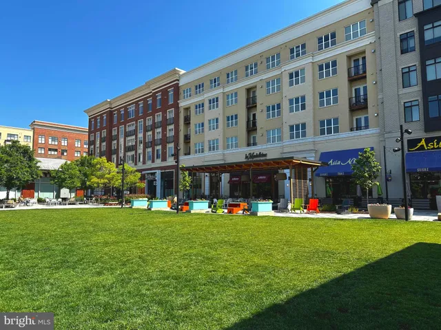 a view of a building with sitting area