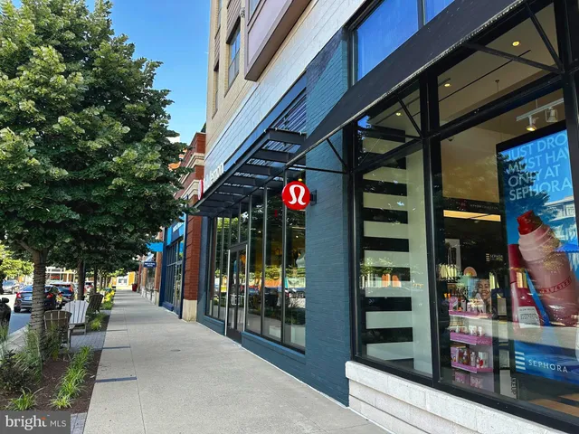 a view of house with swimming pool and lake view