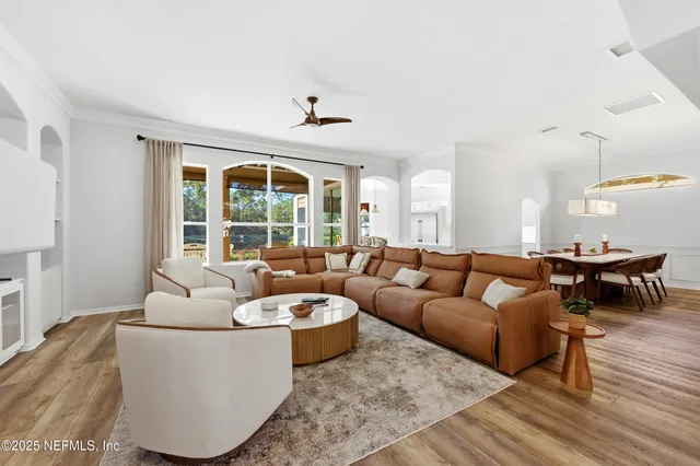 a kitchen with stainless steel appliances a refrigerator sink and cabinets