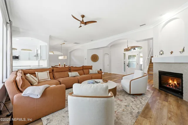 a kitchen with granite countertop a refrigerator and a sink