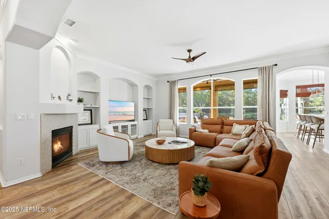 a kitchen with granite countertop a sink and a stove top oven