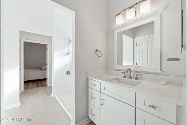 a front view of a house with yard and green space