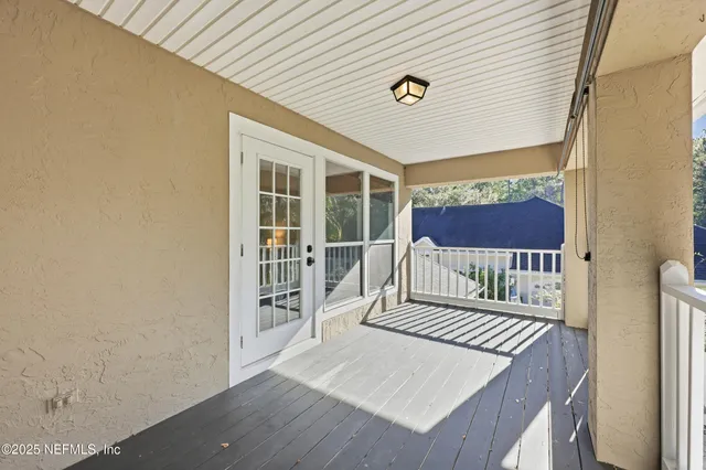 a view of a wrought iron fences in front of house