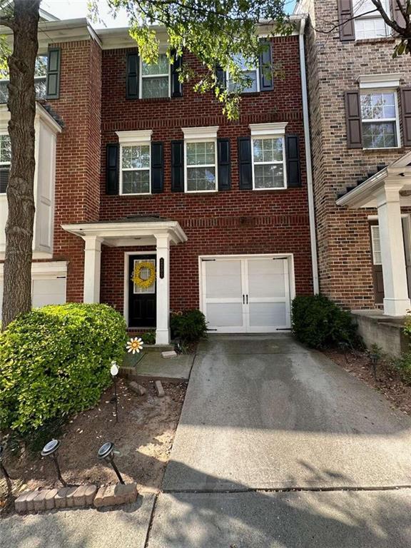2201 Landing Walk Drive Duluth, GA 30097 - Photo 1 of 1 front view of a brick house with a yard