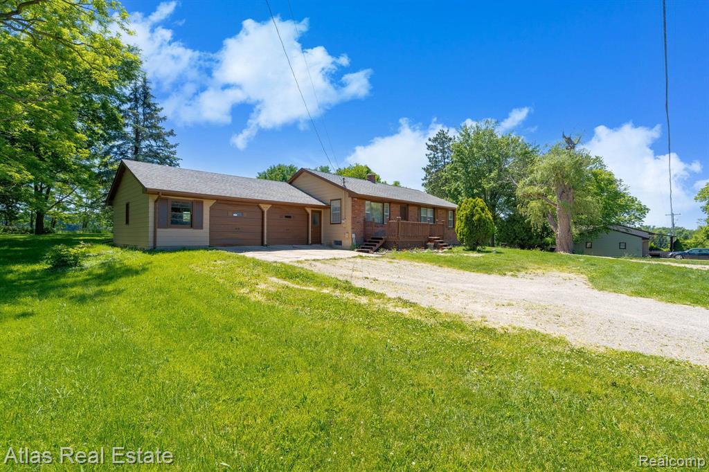 9450 Hogan Road Fenton, MI 48430 - Photo 1 of 36