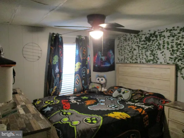 a bathroom with a sink toilet and mirror