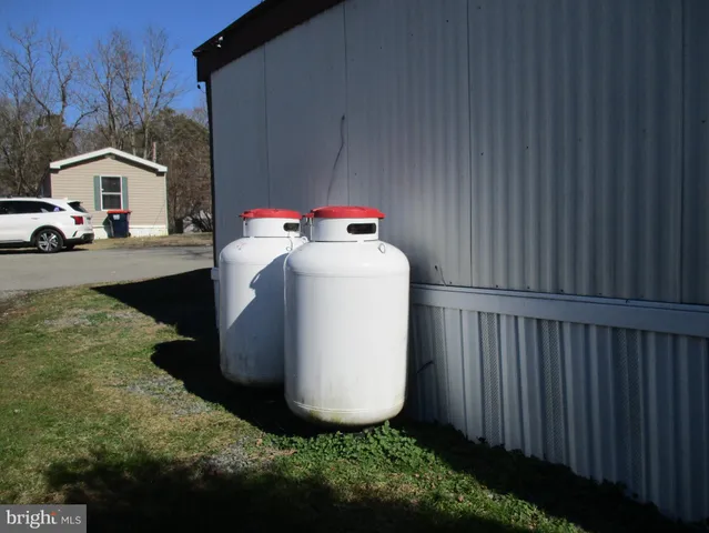 a view of a backyard of the house