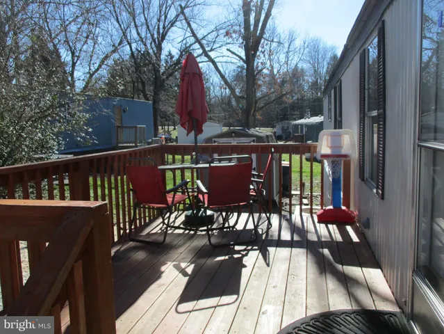a view of balcony with furniture