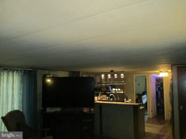 a room with water heater and a window