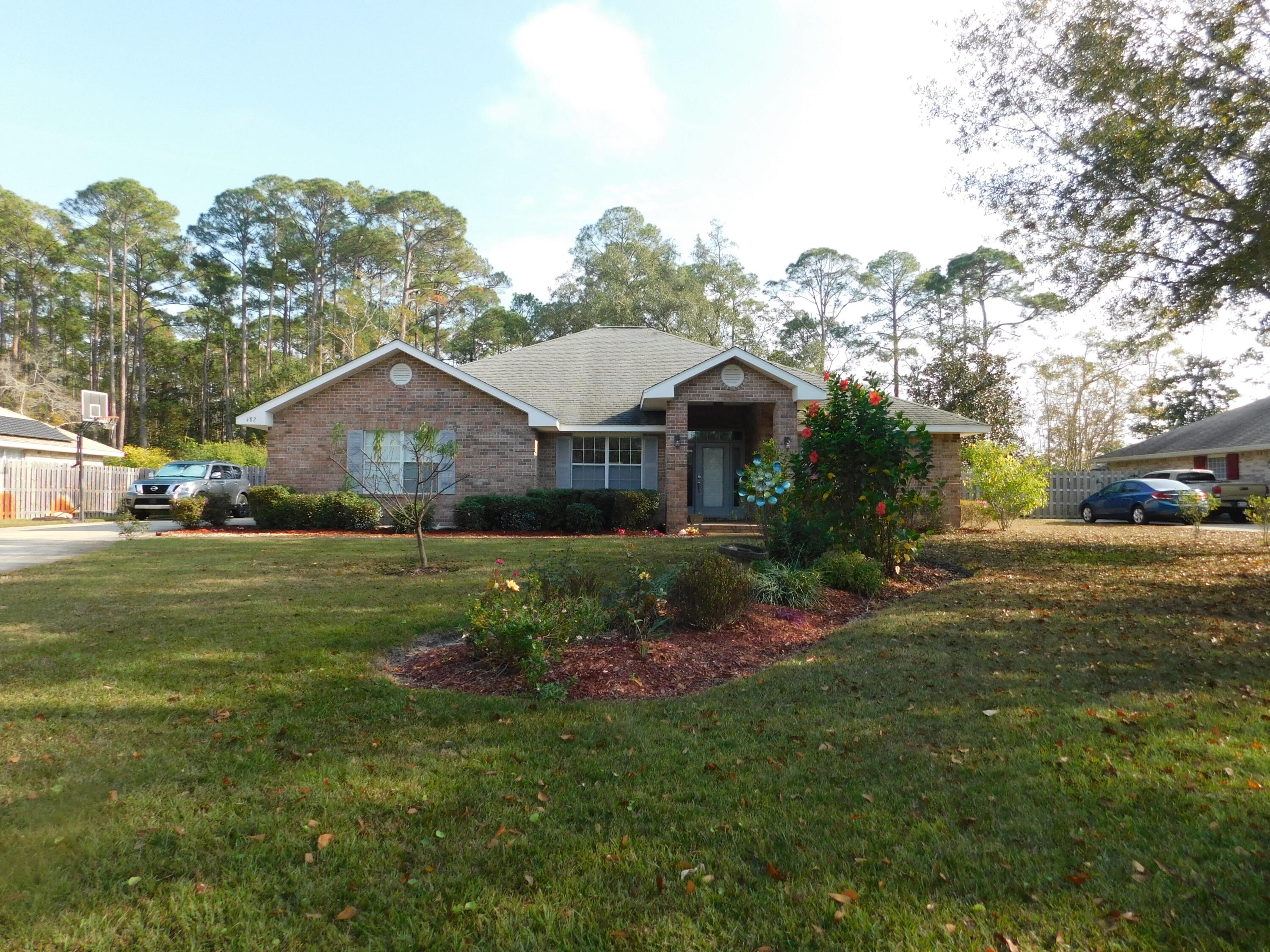 482 Driftwood Point Road Santa Rosa Beach, FL 32459 - Photo 36 of 40 a front view of house with yard and green space