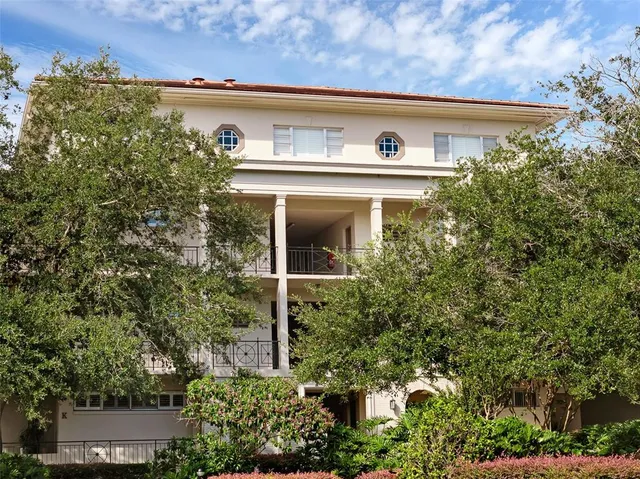 a view of a chairs and tables in the yard