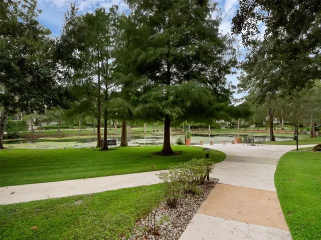 a view of a lake with a yard