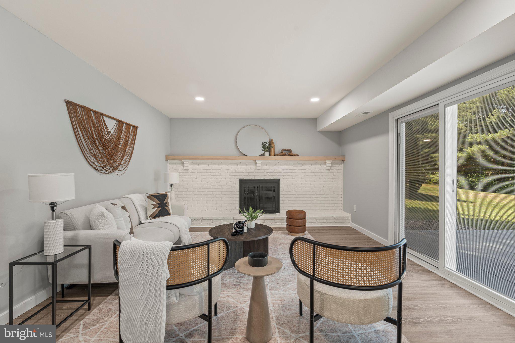 71 Borrelly Boulevard Sewell, NJ 08080 - Photo 12 of 39 a living room with fireplace furniture and a large window