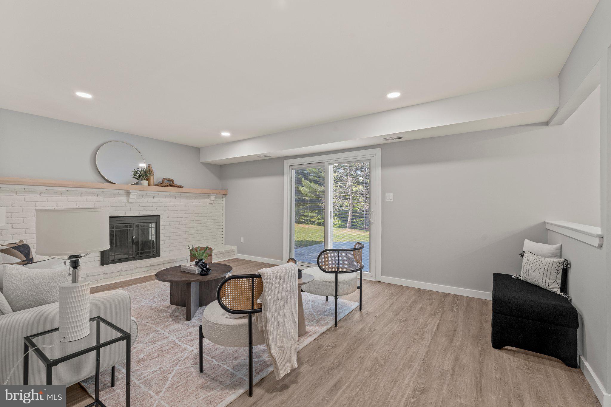 71 Borrelly Boulevard Sewell, NJ 08080 - Photo 13 of 39 a living room with furniture and a fireplace