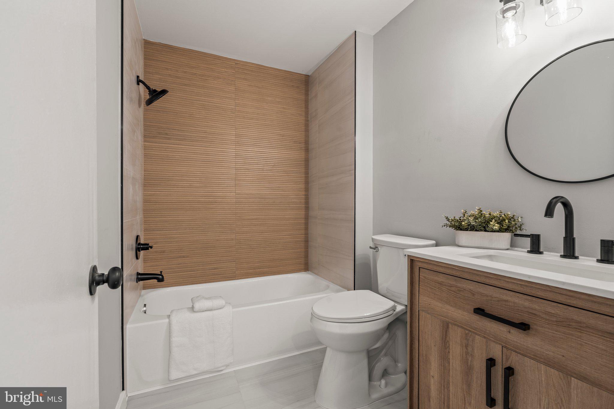 71 Borrelly Boulevard Sewell, NJ 08080 - Photo 22 of 39 a bathroom with a sink a toilet and shower