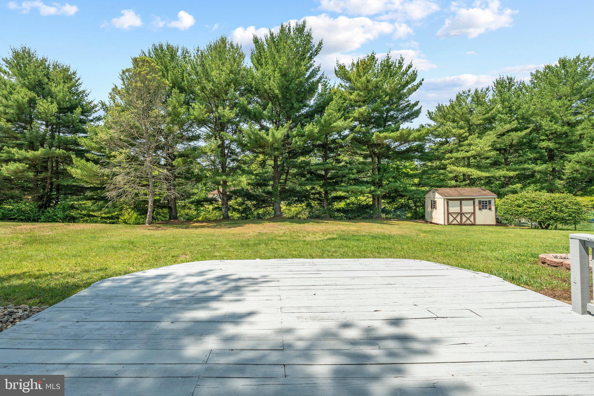 71 Borrelly Boulevard Sewell, NJ 08080 - Photo 28 of 39 a view of a garden and basketball court