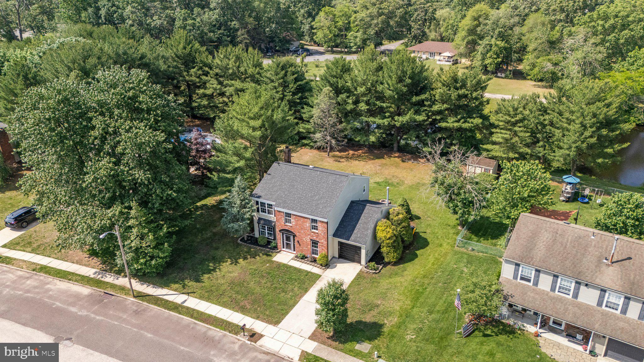 71 Borrelly Boulevard Sewell, NJ 08080 - Photo 32 of 39 an aerial view of residential house with outdoor space and trees all around