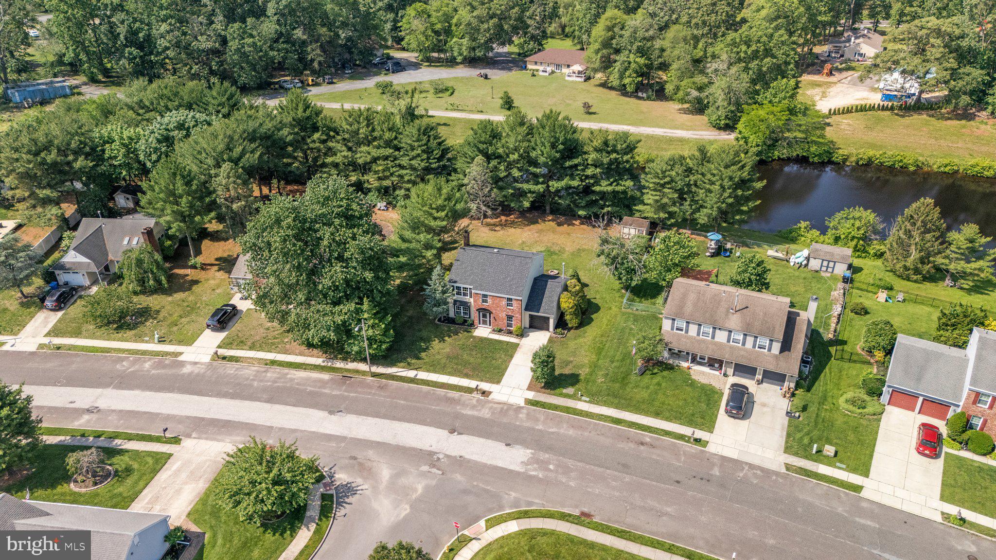 71 Borrelly Boulevard Sewell, NJ 08080 - Photo 37 of 39 an aerial view of a house with a garden and lake view