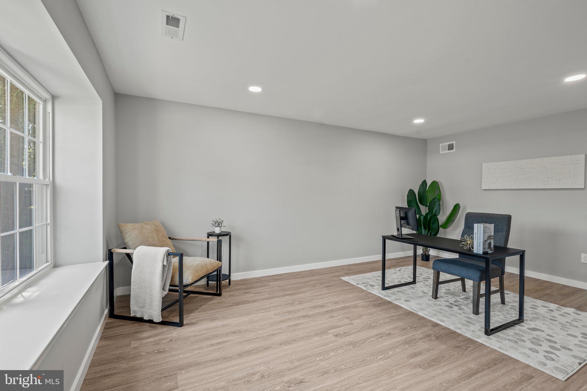 71 Borrelly Boulevard Sewell, NJ 08080 - Photo 4 of 39 a workspace room with furniture and wooden floor