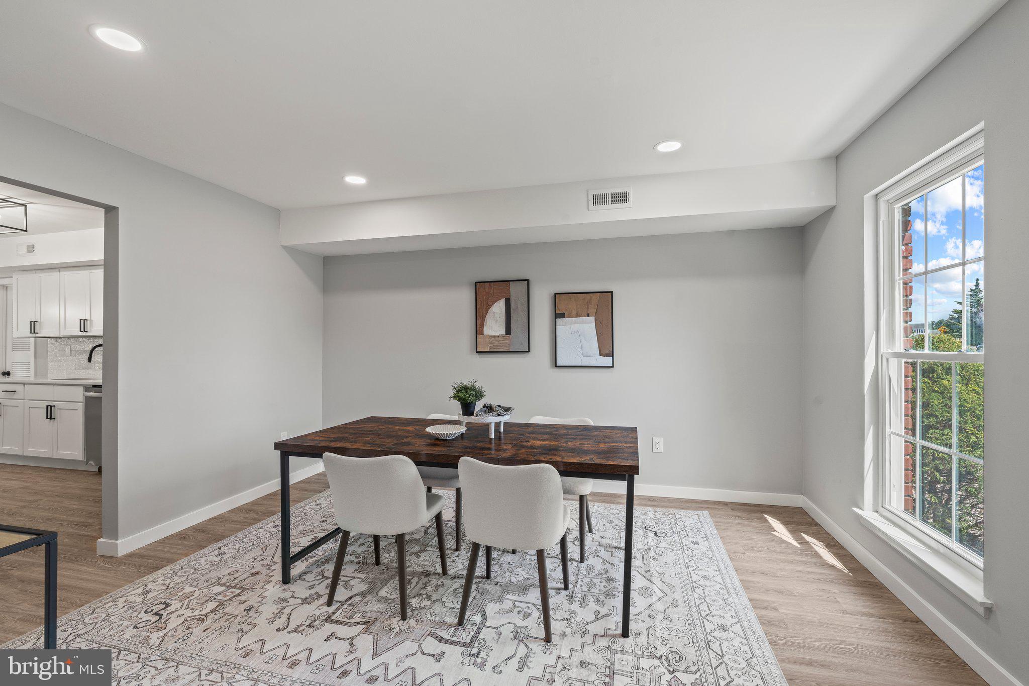 71 Borrelly Boulevard Sewell, NJ 08080 - Photo 5 of 39 a view of a dining room with furniture and wooden floor