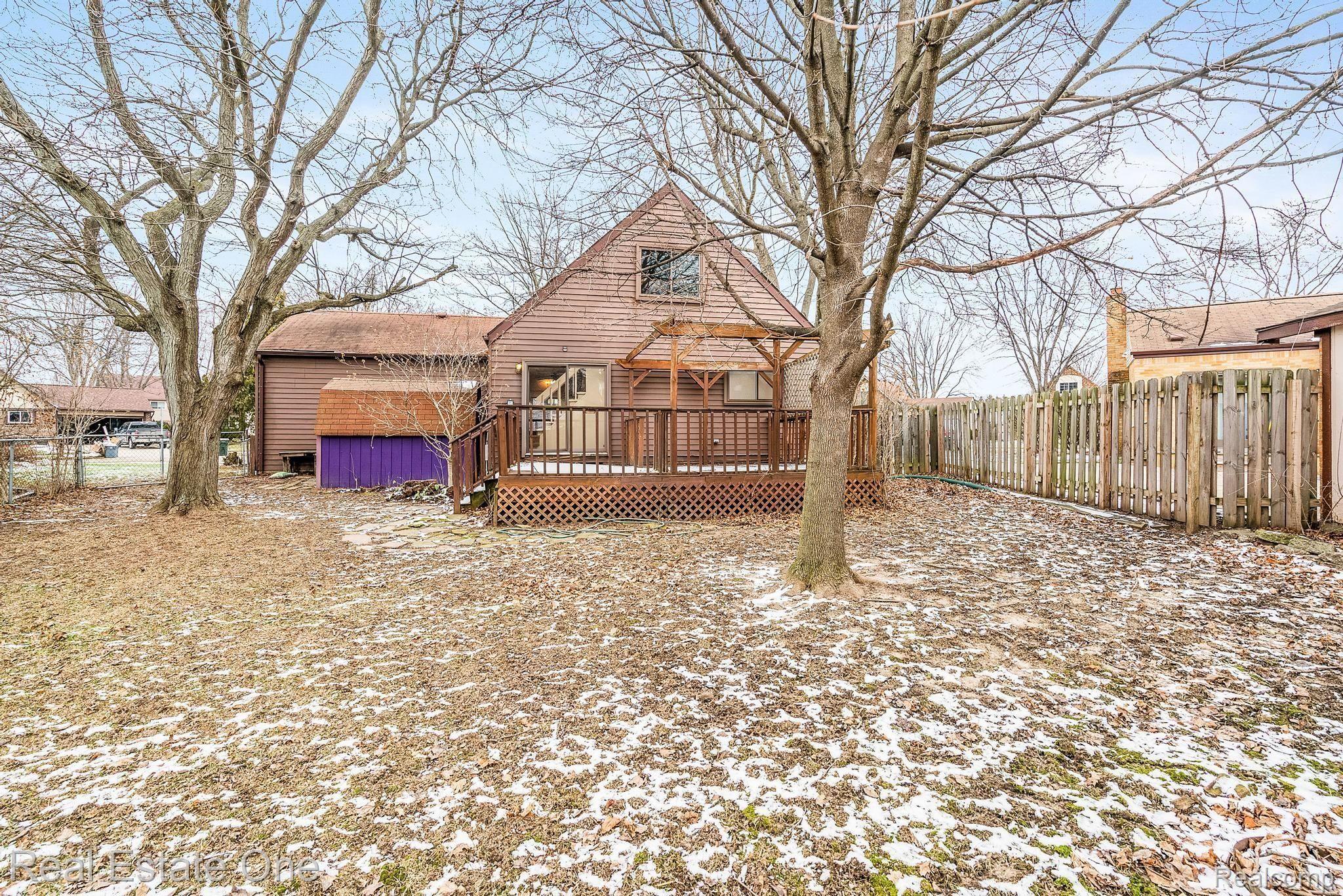 Rear view of home and Yard