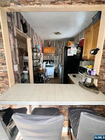 a room with furniture and a flat screen tv