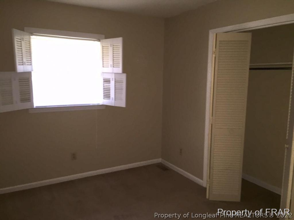 1413 Hibiscus Road Fayetteville, NC 28311 - Photo 3 of 10 a view of a small space with a window
