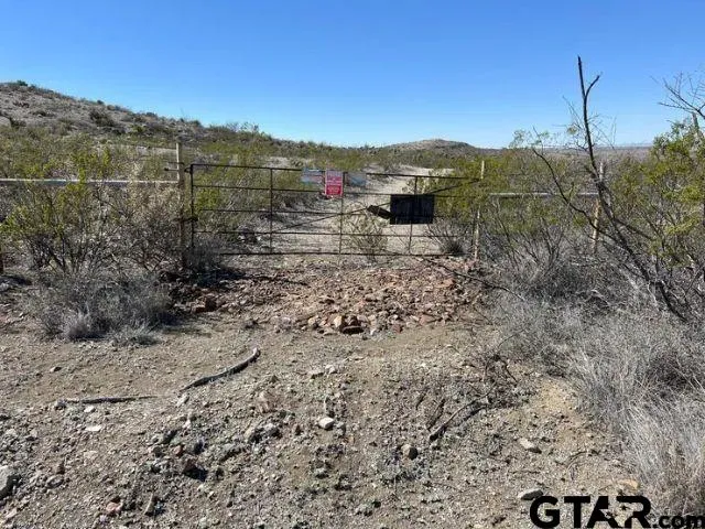 a view of a lake with mountains in the background