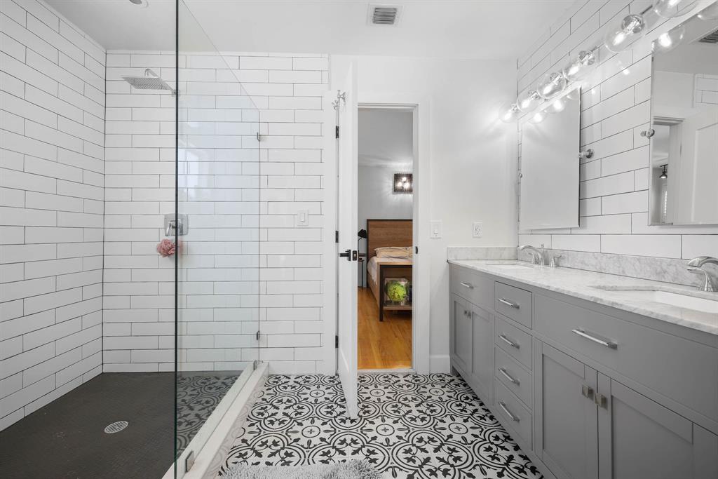 3161 North 36th Street Hollywood, FL 33021 - Photo 33 of 70 a bathroom with a sink a toilet and shower