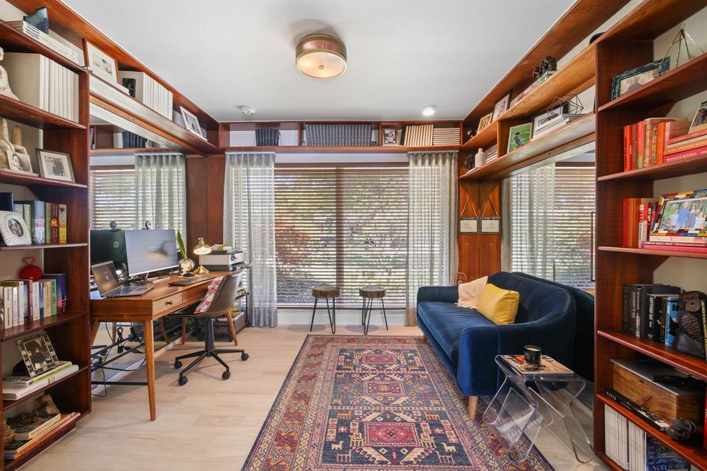3161 North 36th Street Hollywood, FL 33021 - Photo 45 of 70 a living room with furniture and a book shelf