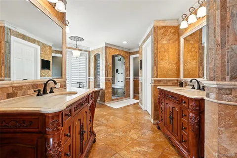 a spacious bathroom with a sink double vanity