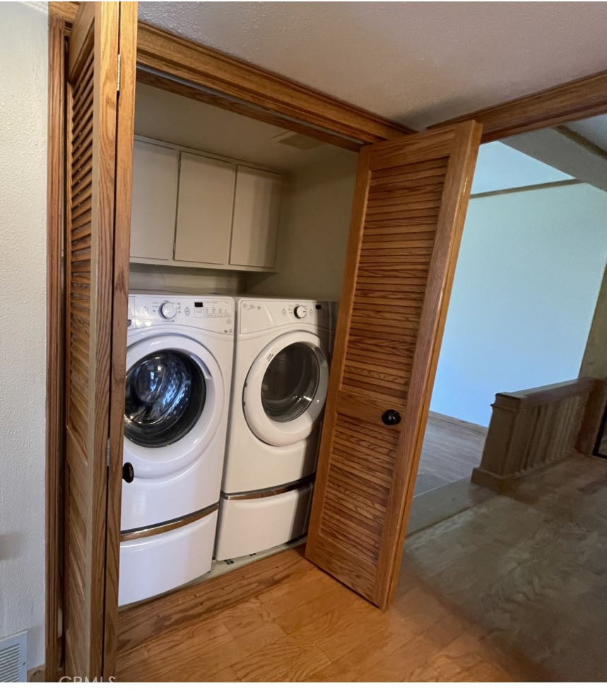 8 Solana, Unit 36 Irvine, CA 92612 - Photo 13 of 22 a utility room with dryer and washer