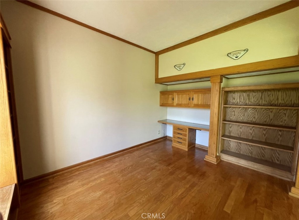8 Solana, Unit 36 Irvine, CA 92612 - Photo 15 of 22 a view of a room with wooden floor and a window