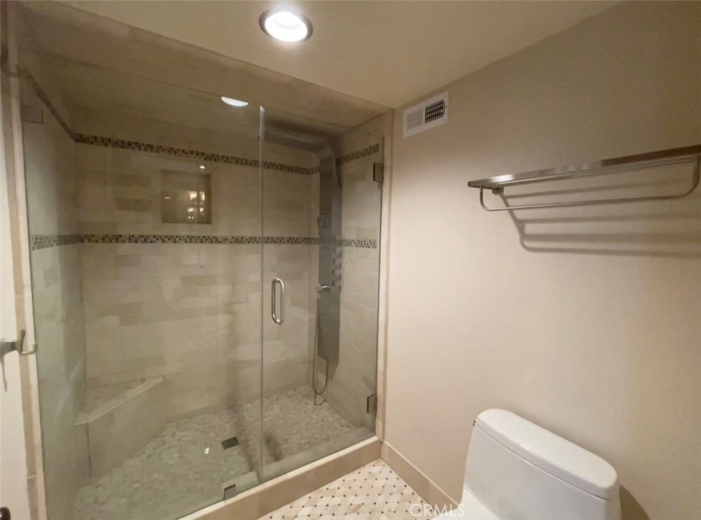 8 Solana, Unit 36 Irvine, CA 92612 - Photo 3 of 22 a bathroom with a shower and toilet