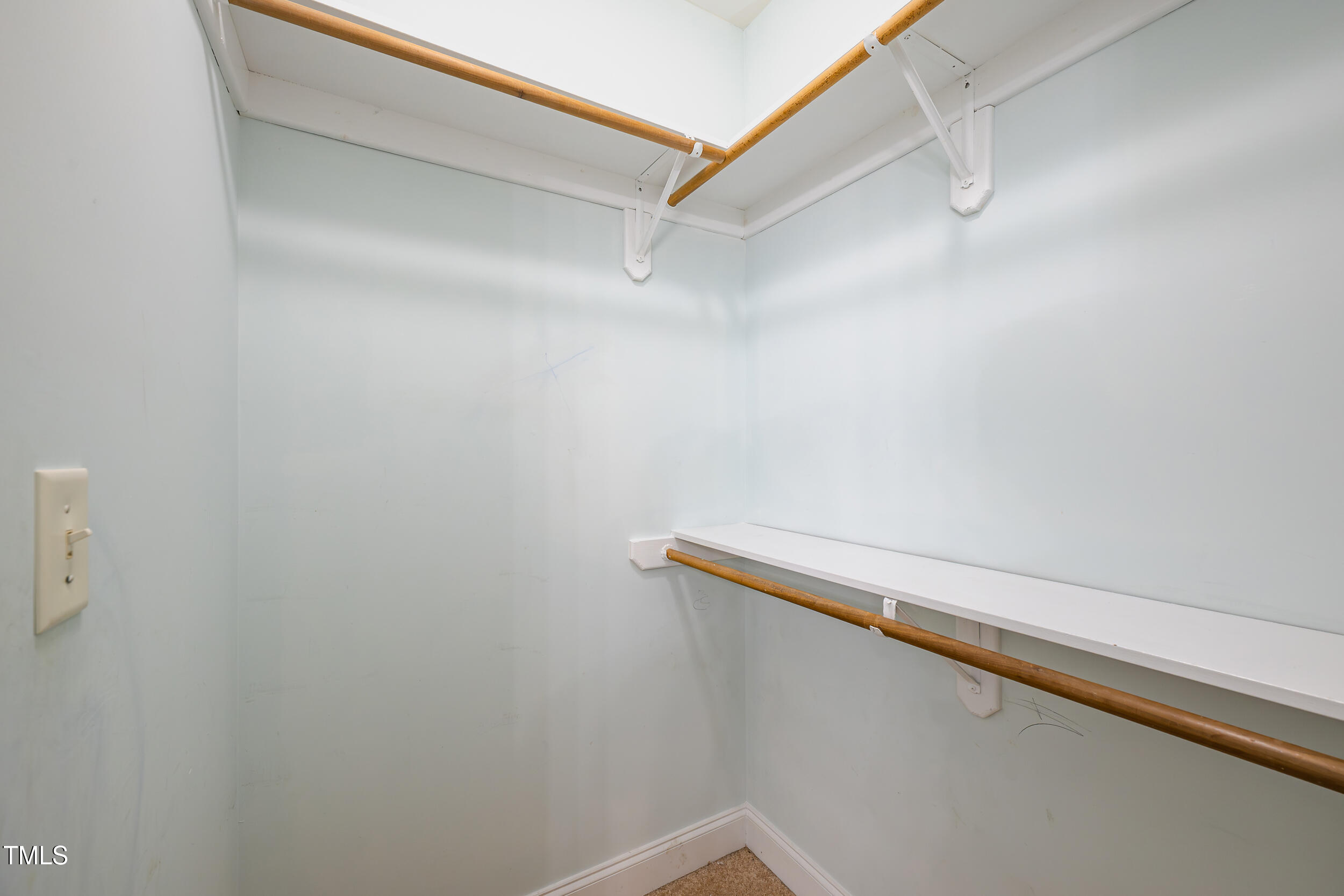 2430 Josephine Road Garner, NC 27529 - Photo 21 of 48 a close up view of racks on the wall