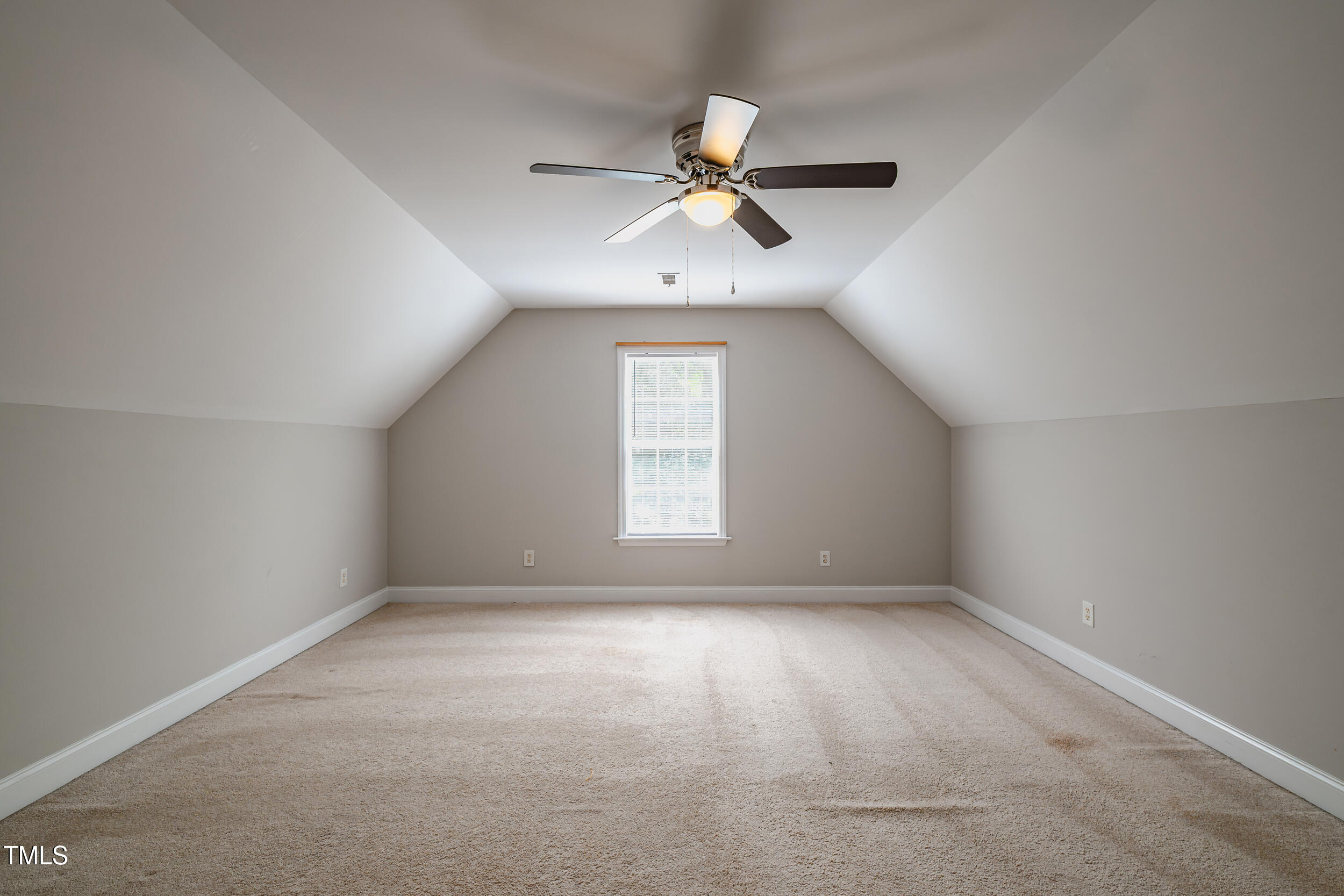 2430 Josephine Road Garner, NC 27529 - Photo 29 of 48 a view of an empty room with a window
