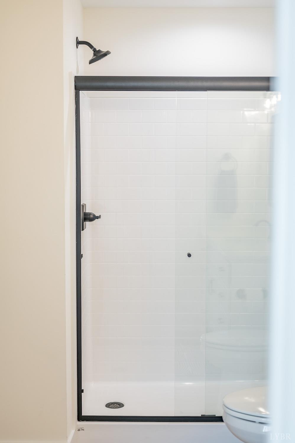 556 Leesville Road, Unit 905 Lynchburg, VA 24502 - Photo 29 of 40 a bathroom with a shower