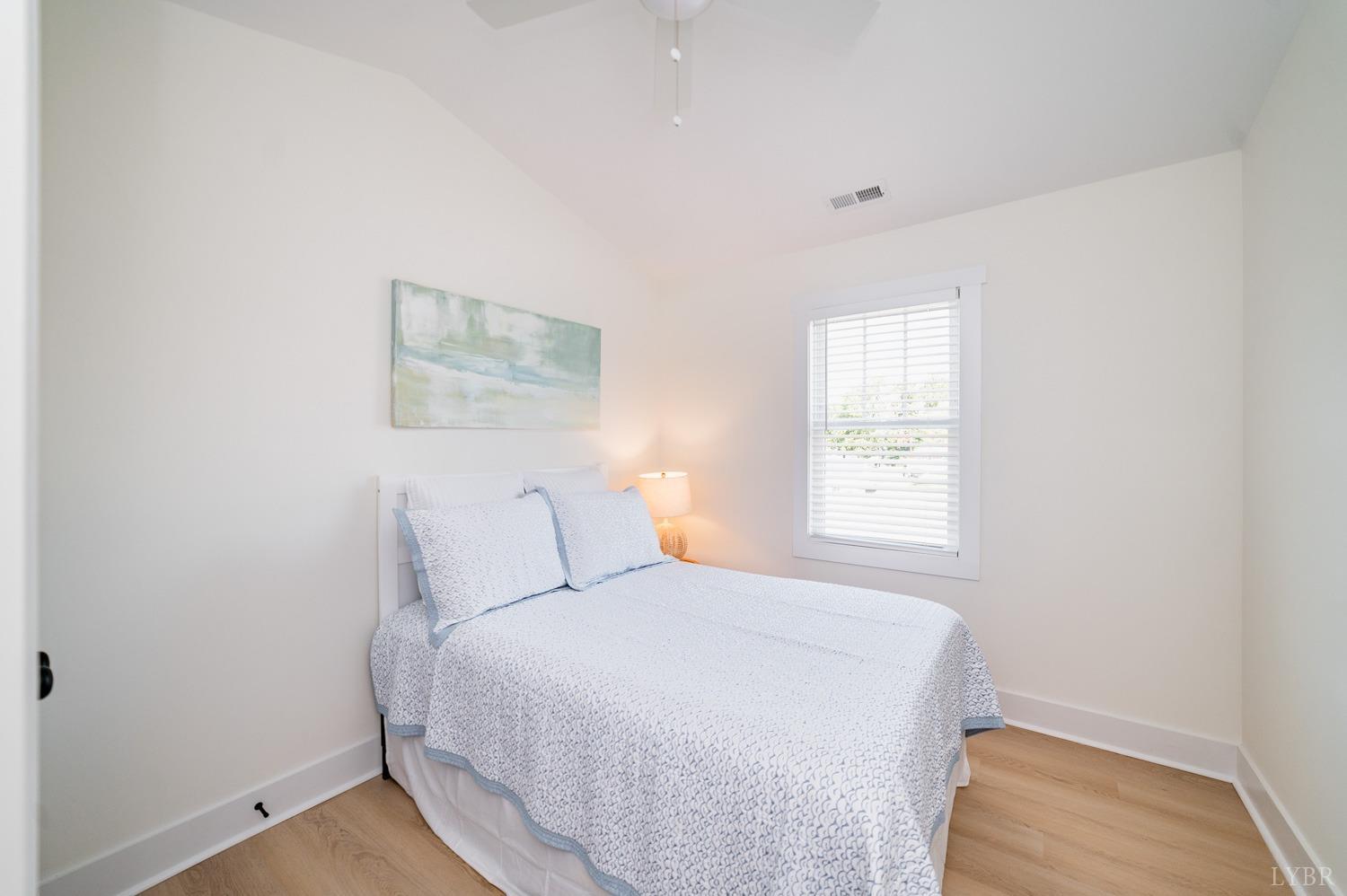 556 Leesville Road, Unit 905 Lynchburg, VA 24502 - Photo 32 of 40 a bedroom with a bed and a window